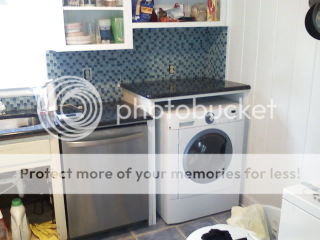 mosaics over washer area